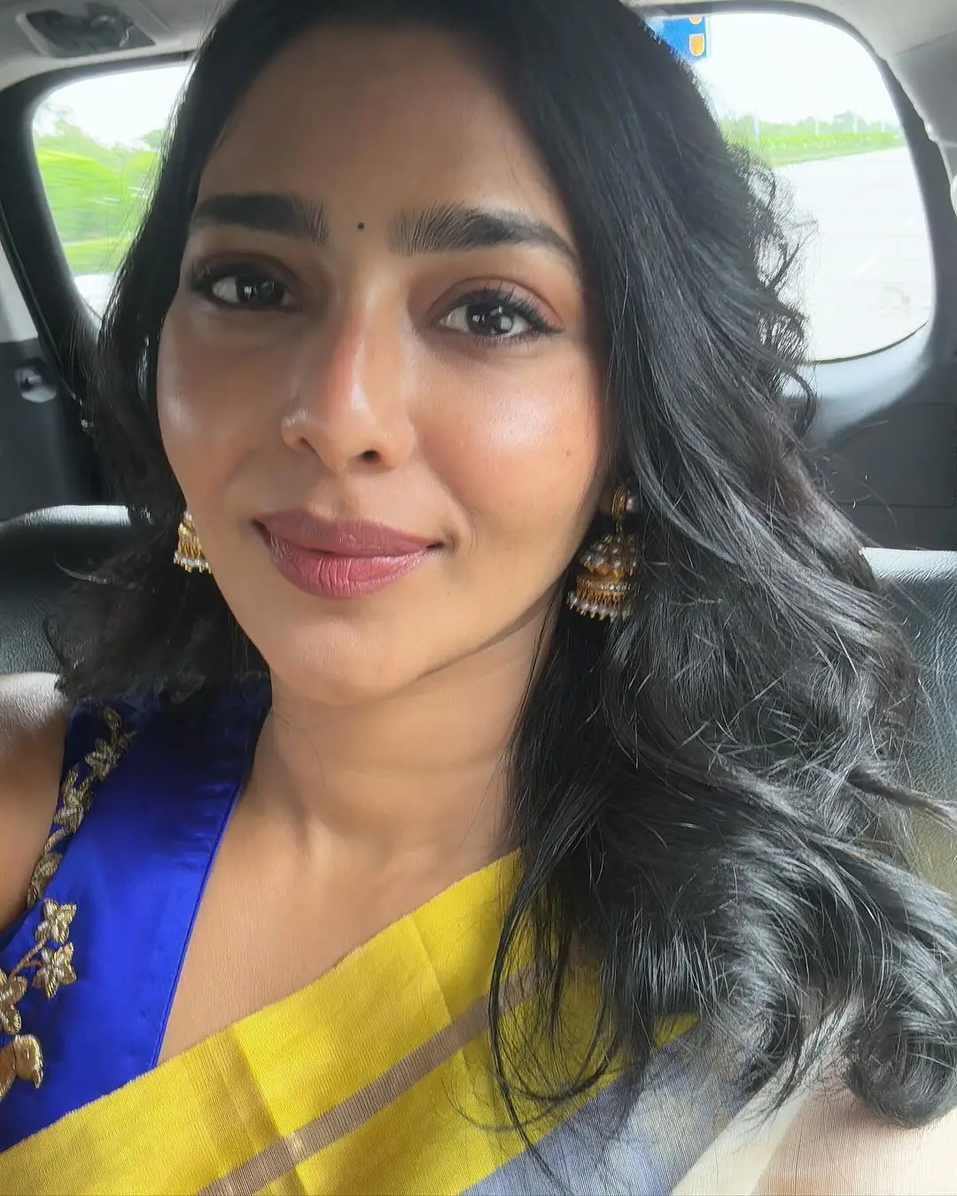 Aishwarya Lekshmi Wearing White Saree Blue Sleeveless Blouse